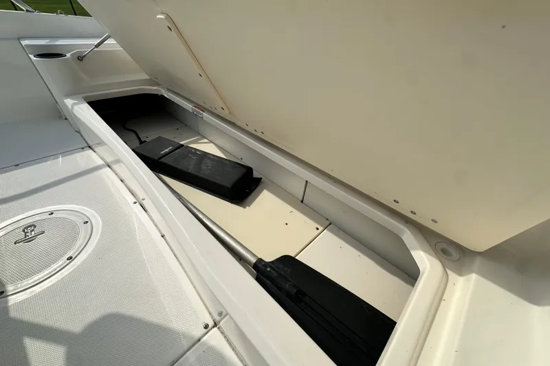 Slide: The Image of Storage compartment of a 2008 Boston Whaler 180 Dauntless boat, open and empty. - 45