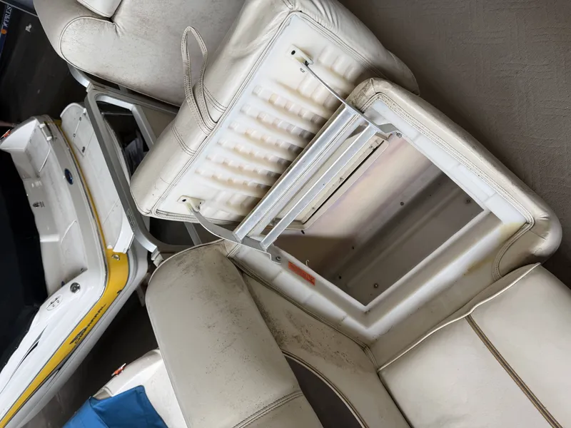 Slide: The Image of Premier 270 Grand Majestic 2003 boat seat with storage compartment. - 11