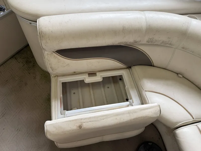 Slide: The Image of Interior of a 2003 Premier 270 Grand Majestic with open seat compartment. - 15