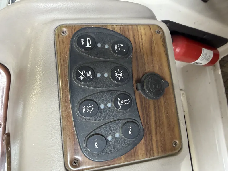 Slide: The Image of Control panel of a 2003 Premier 270 Grand Majestic boat. - 24