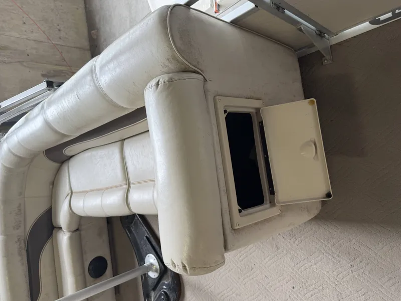 Slide: The Image of Interior of a 2003 Premier 270 Grand Majestic boat with storage compartment. - 27