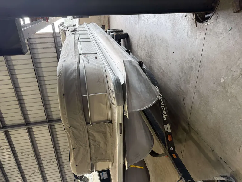 Slide: The Image of 2003 Premier 270 Grand Majestic boat in storage facility. - 3