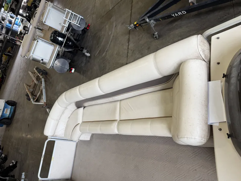Slide: The Image of Premier 270 Grand Majestic 2003 pontoon boat in storage. - 30