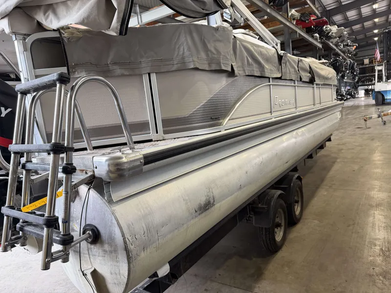 Slide: The Image of 2003 Premier 270 Grand Majestic pontoon boat in storage facility. - 5