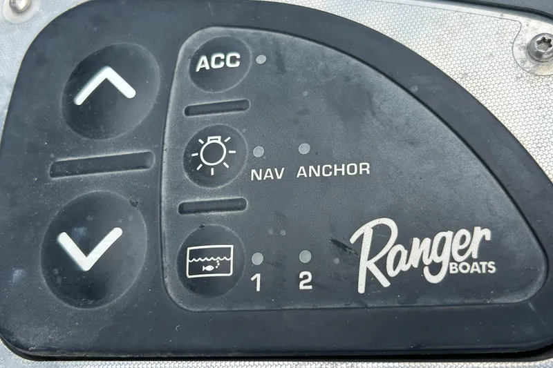 Slide: The Image of 2008 Ranger Z22 Comanche boat interior with gray and black seating. - 13