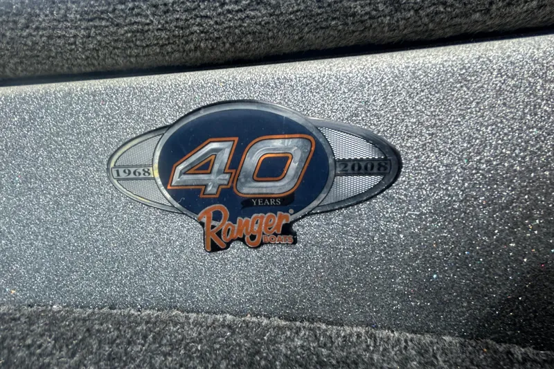 Slide: The Image of Control panel of a 2008 Ranger Z22 Comanche boat with navigation and anchor controls. - 15