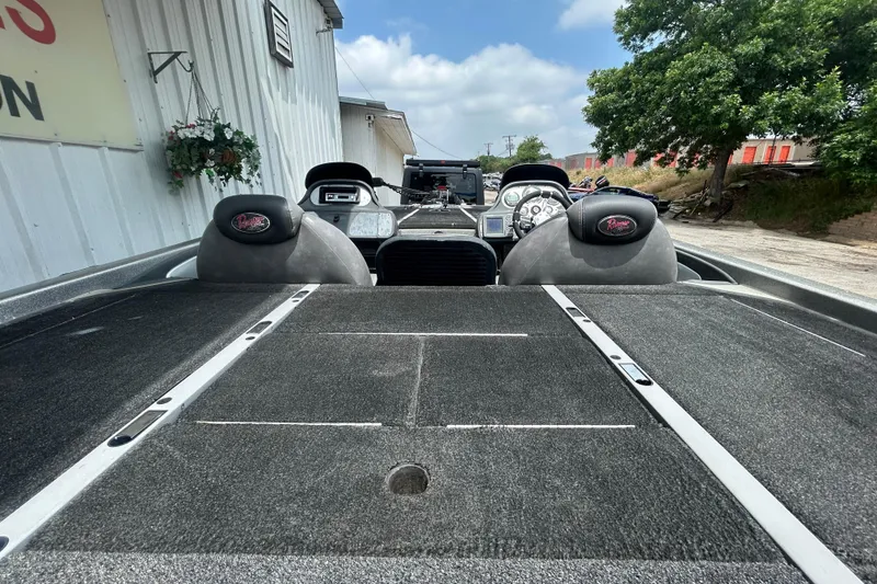 Slide: The Image of Control panel of a 2008 Ranger Z22 Comanche boat with various buttons and indicators. - 16