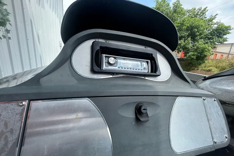 Slide: The Image of 2008 Ranger Z22 Comanche with OptiMax Pro XS engine in a parking area. - 19