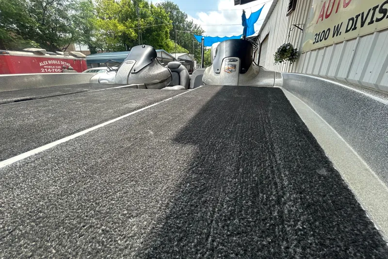 Slide: The Image of 2008 Ranger Z22 Comanche boat with 40th anniversary badge, silver and black design. - 20