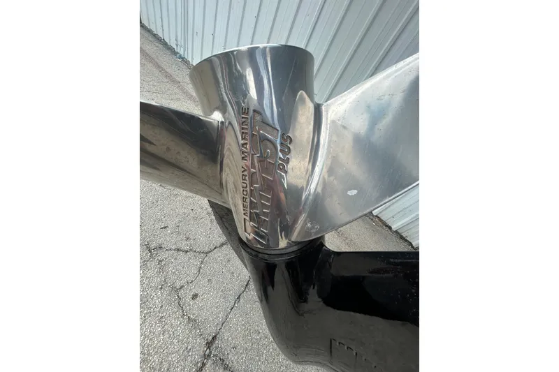 Slide: The Image of 2008 Ranger Z22 Comanche boat deck with textured surface, parked outdoors. - 22