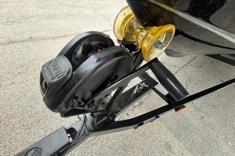 Slide: The Image of Close-up of a metal boat propeller on a 2008 Ranger Z22 Comanche. - 23