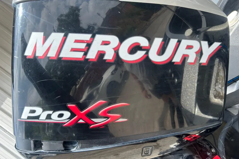 Slide: The Image of Close-up of a 2008 Ranger Z22 Comanche with OptiMax Pro XS 250 engine decal. - 33