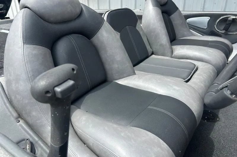 Slide: The Image of 2008 Ranger Z22 Comanche boat in a spacious garage, featuring a Mercury Pro XS engine. - 9