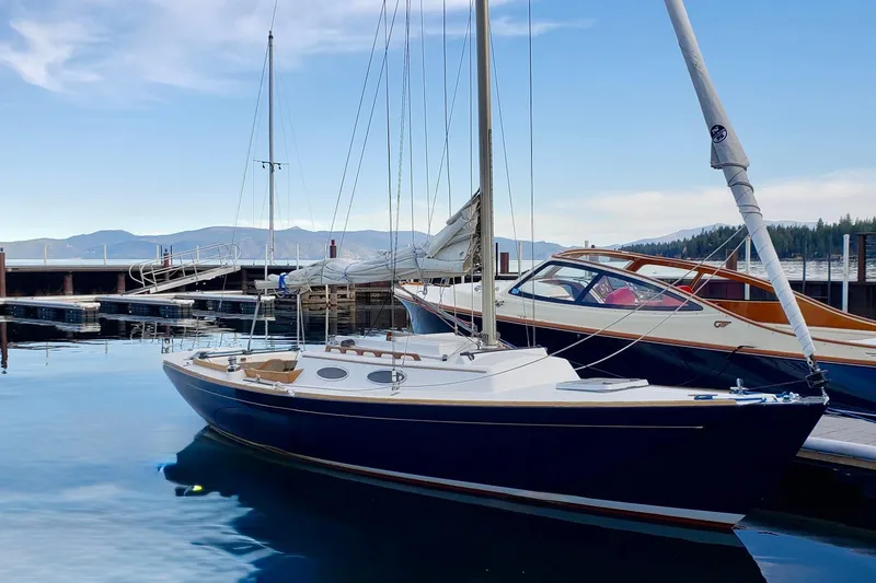 The Image of 2003 Alerion Express 28 docked at a marina on the West Shore of Lake Tahoe. - 0