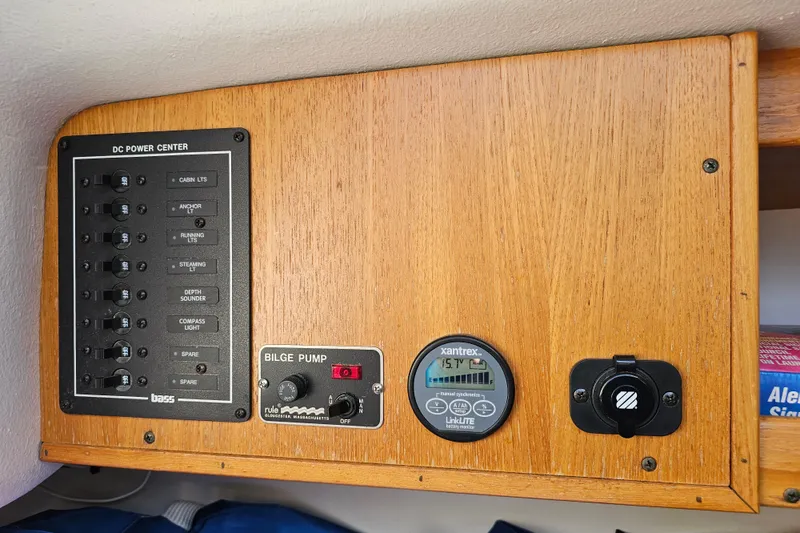 Slide: The Image of Panel, Electric Bilge Pump control, Battery Monitor and DC outlet.  - 11