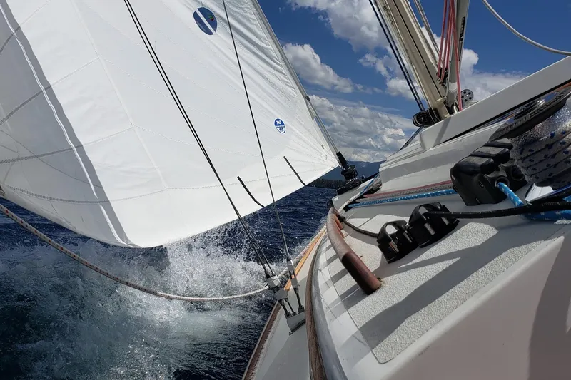Slide: The Image of Under sail on the 2003 Alerion Express 28, cutting through the waters of Lake Tahoe. - 3