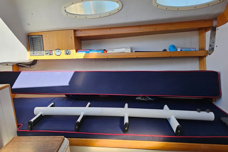 Slide: The Image of Port interior w/ cushion detail and swim ladder - 9