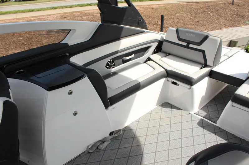 Slide: The Image of Interior of 2020 Yamaha Boats 275SE, featuring sleek seating and modern design elements. - 11