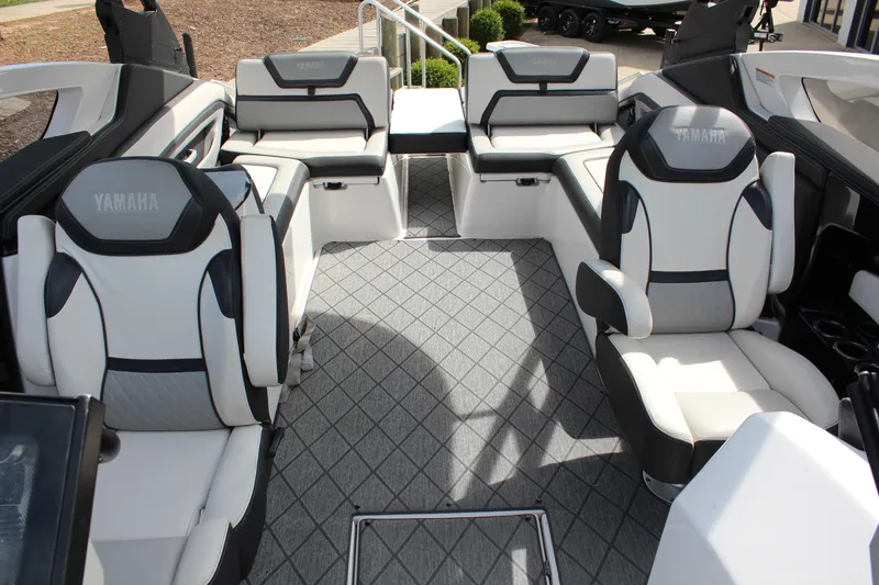 Slide: The Image of Interior of 2020 Yamaha Boats 275SE, featuring luxurious seating and modern design. - 16