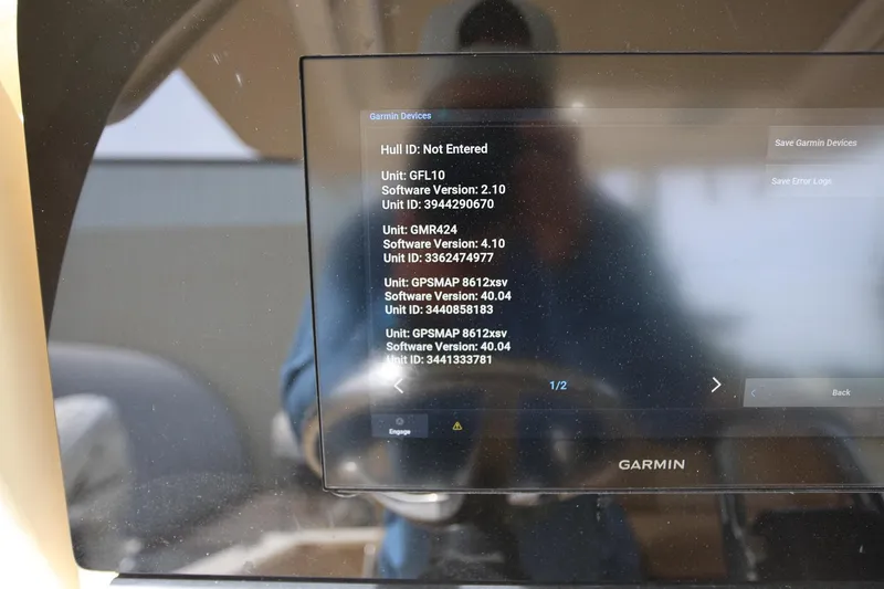 Slide: The Image of Garmin device screen on 2018 Scout 300 LXF boat displaying software versions and unit IDs. - 33