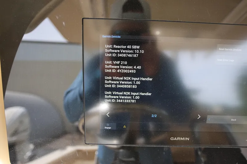 Slide: The Image of Garmin device screen on 2018 Scout 300 LXF boat displaying software versions and unit IDs. - 34