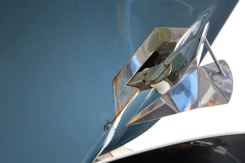 Slide: The Image of Close-up of a 2018 Scout 300 LXF boat anchor against a blue hull. - 8