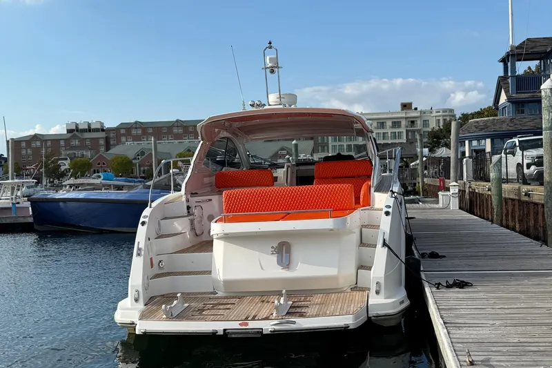 Slide: The Image of Azimut Atlantis 43 yacht, 2016 model, docked with vibrant orange seating. - 10