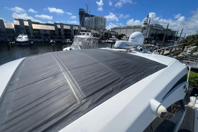 Slide: The Image of Azimut Atlantis 43 yacht, 2020 model, docked at marina with clear blue sky. - 21