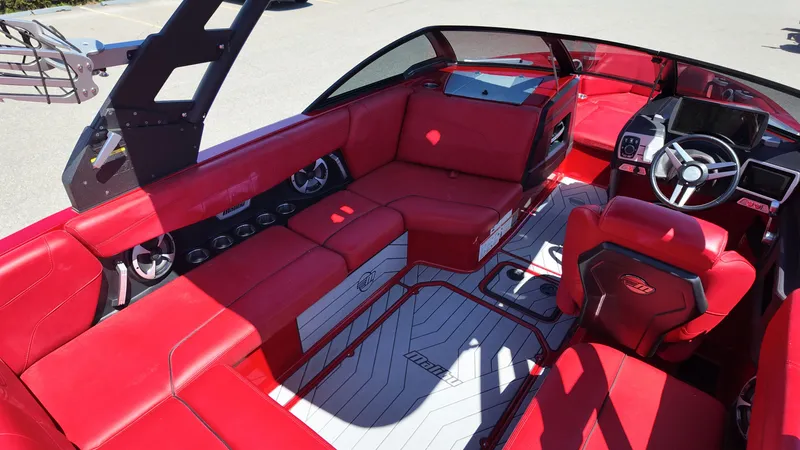 Slide: The Image of Interior of 2019 Malibu Wakesetter 22 LSV with red seating. - 10