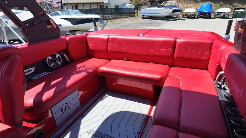 Slide: The Image of Interior of 2019 Malibu Wakesetter 22 LSV with red leather seating. - 11