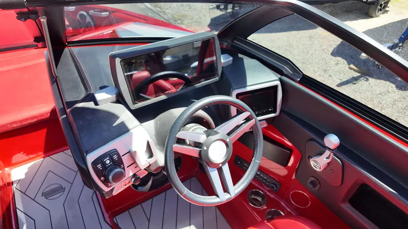 Slide: The Image of 2019 Malibu Wakesetter 22 LSV interior with red accents. - 12