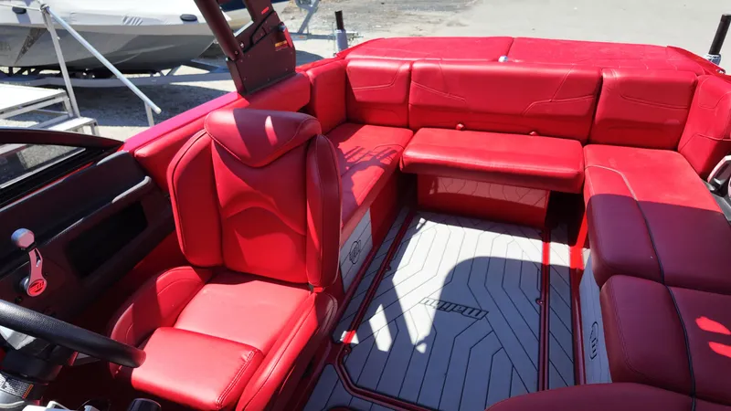 Slide: The Image of 2019 Malibu Wakesetter 22 LSV interior with red leather seating. - 14