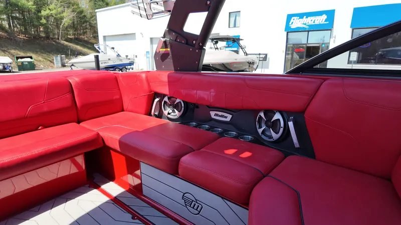 Slide: The Image of Interior of 2019 Malibu Wakesetter 22 LSV with red leather seating. - 15