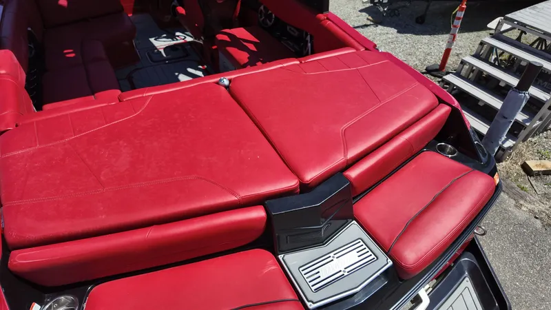 Slide: The Image of Red interior of a 2019 Malibu Wakesetter 22 LSV boat. - 7