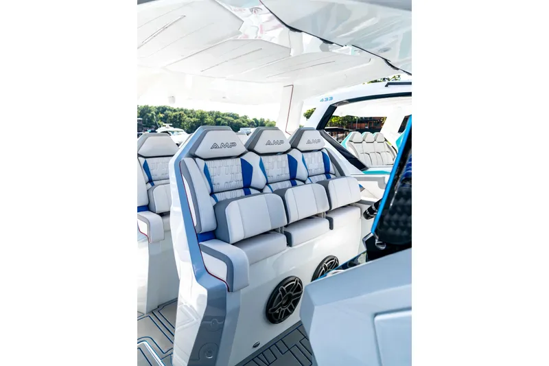 Slide: The Image of Luxurious interior of 2026 AMP 433 boat with modern seating design. - 11