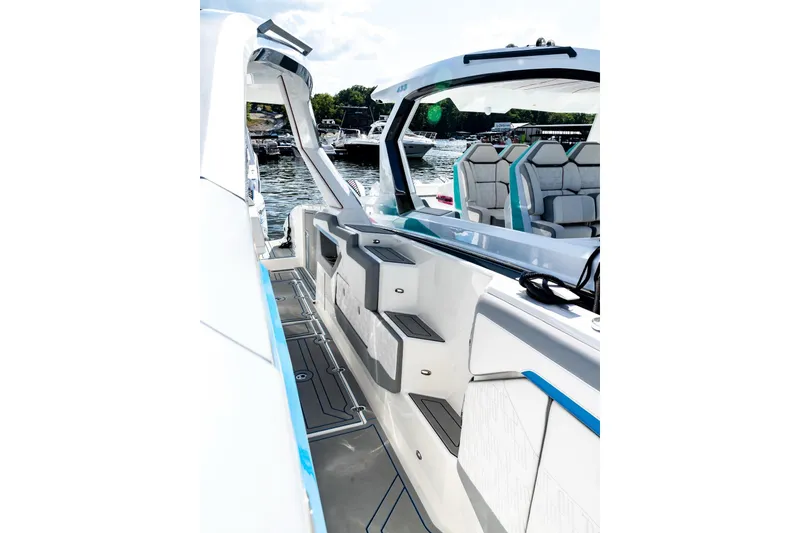 Slide: The Image of Futuristic AMP 433 boat interior, 2026 model, featuring sleek design and modern seating. - 13