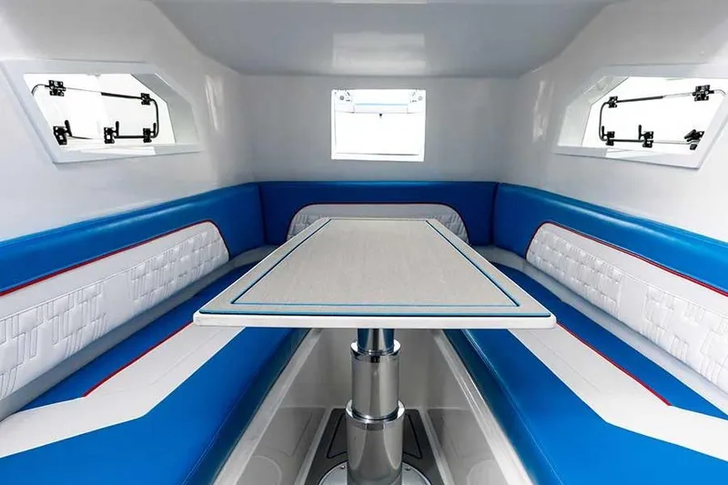 Slide: The Image of Modern AMP 433 boat interior with blue and white seating, 2026 model. - 18