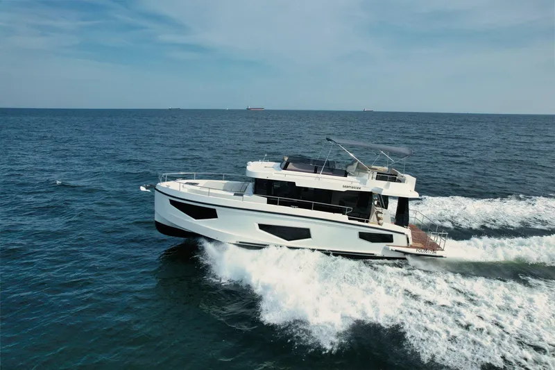 The Image of Cobra Yachts Seamaster 45, 2026 model, cruising on open sea under clear skies. - 1