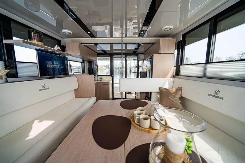 Slide: The Image of Luxurious interior of 2026 Cobra Yachts Seamaster 45 with elegant seating and decor. - 13