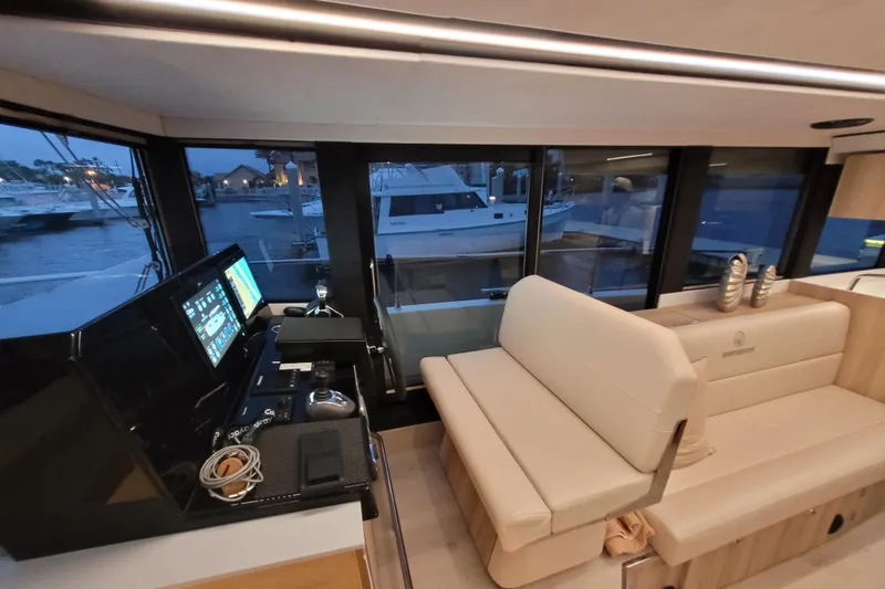 Slide: The Image of Interior of 2026 Cobra Yachts Seamaster 45, featuring modern helm and seating area. - 33