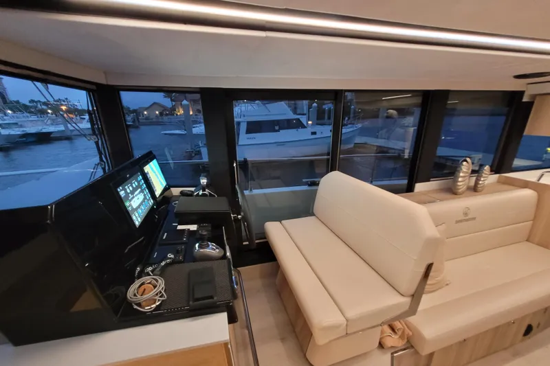Slide: The Image of Interior of 2026 Cobra Yachts Seamaster 45, featuring modern helm and seating area. - 34