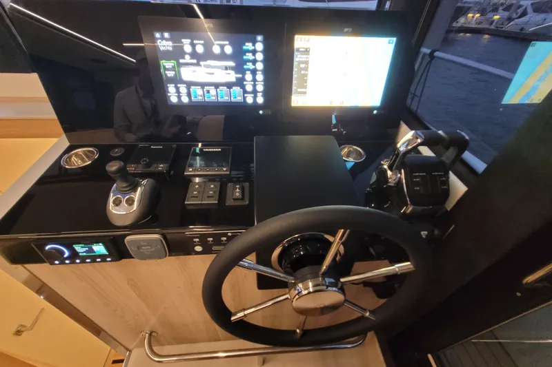 Slide: The Image of Cockpit of 2026 Cobra Yachts Seamaster 45, featuring advanced navigation and control systems. - 35