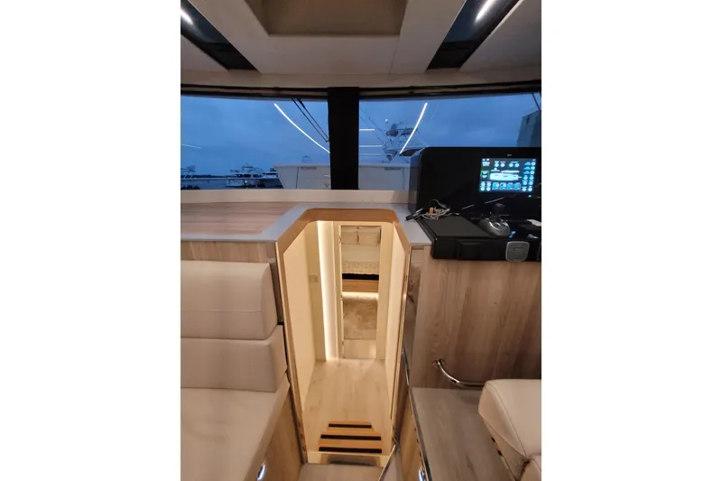 Slide: The Image of Interior view of 2026 Cobra Yachts Seamaster 45, featuring modern design and navigation controls. - 37