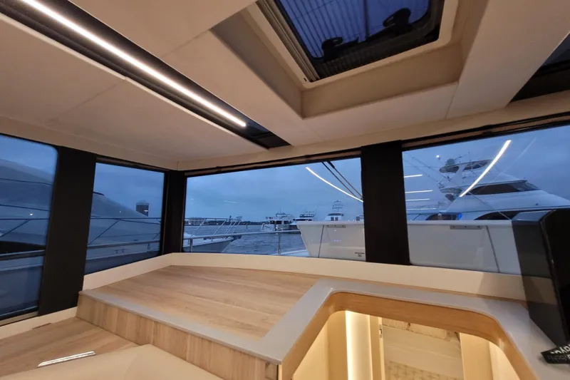 Slide: The Image of Interior view of 2026 Cobra Yachts Seamaster 45, showcasing modern design and marina backdrop. - 38