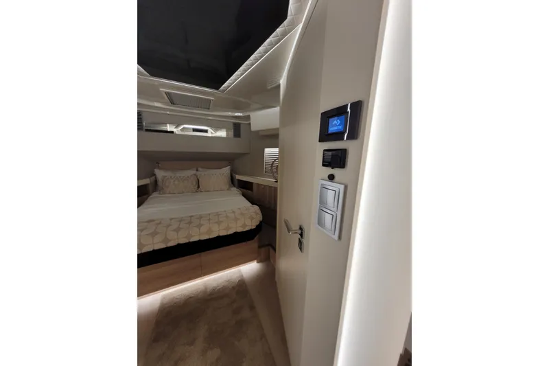 Slide: The Image of Luxurious bedroom interior of 2026 Cobra Yachts Seamaster 45, featuring modern design and cozy bedding. - 42