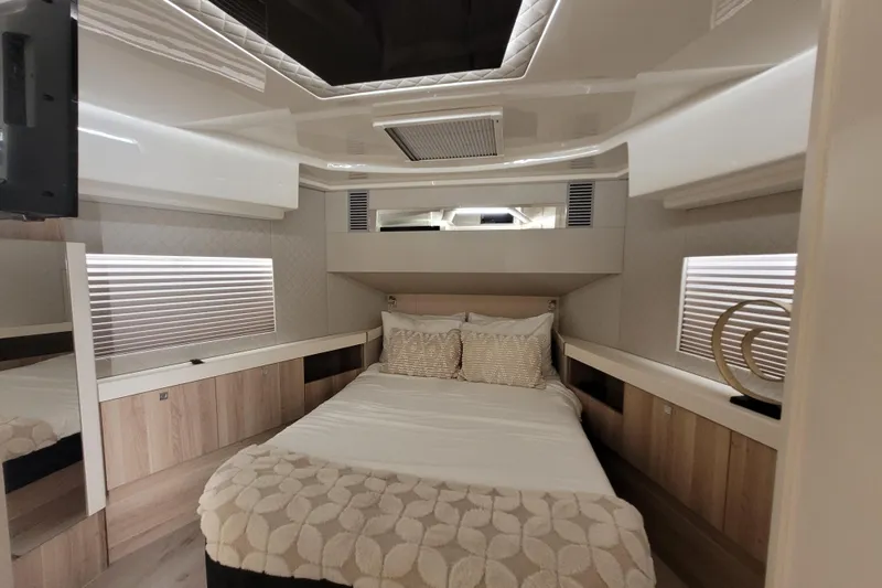 Slide: The Image of Luxurious interior of 2026 Cobra Yachts Seamaster 45, featuring a cozy bedroom with modern design. - 43