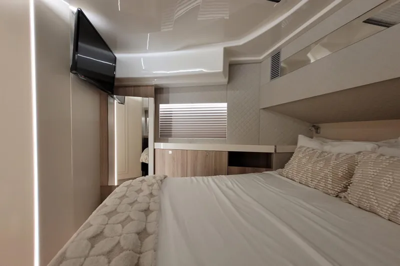 Slide: The Image of Luxurious bedroom interior of 2026 Cobra Yachts Seamaster 45 with modern decor and TV. - 46