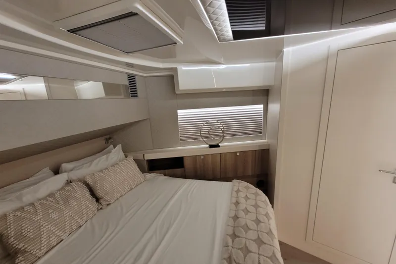 Slide: The Image of Luxurious interior of 2026 Cobra Yachts Seamaster 45, featuring elegant bedroom design. - 47