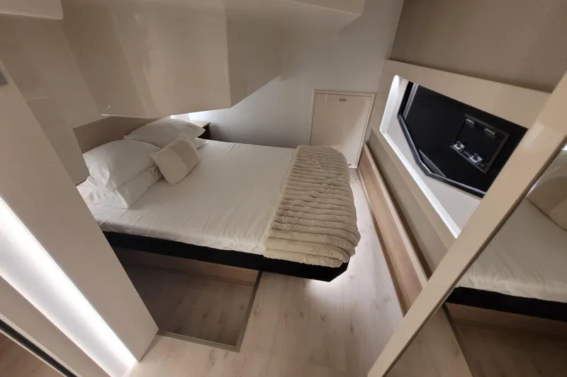 Slide: The Image of Luxurious bedroom interior of 2026 Cobra Yachts Seamaster 45, featuring modern design and cozy bedding. - 53