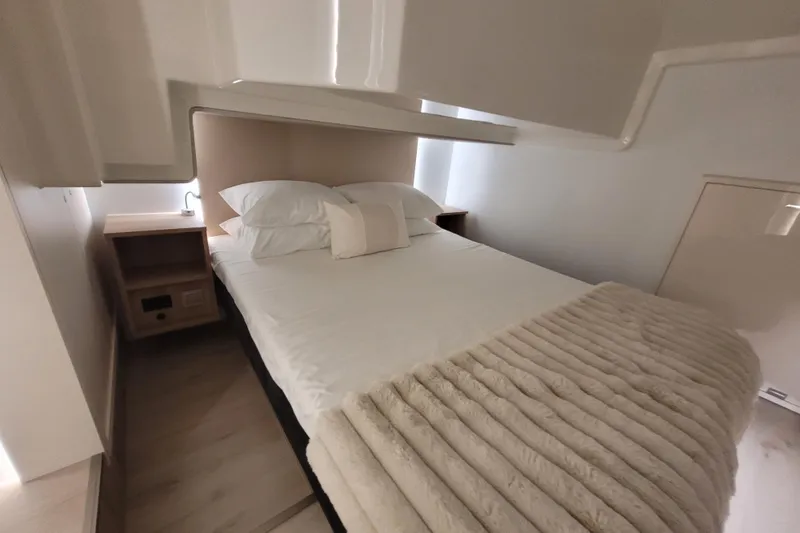 Slide: The Image of Luxurious bedroom interior of 2026 Cobra Yachts Seamaster 45, featuring a cozy bed and modern design. - 54